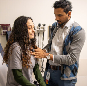 dr-paul-w-patient-082824 Provider examining patient.